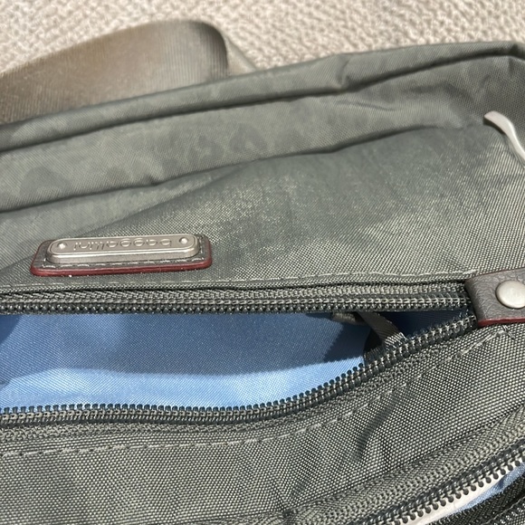 Baggallini. Brand new with tags. Grey with subtle cheetah print background. - Picture 9 of 12